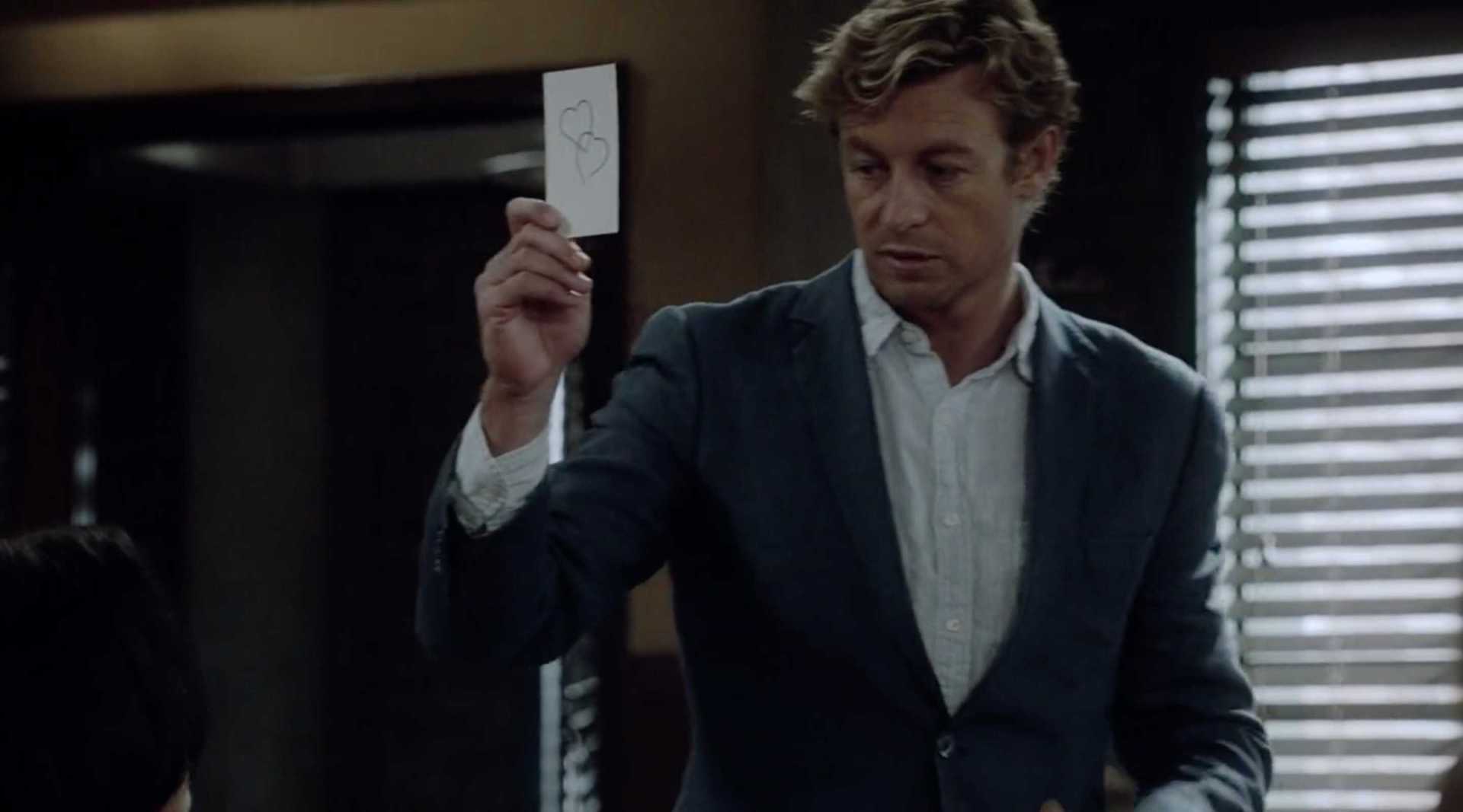 The Mentalist - Patrick Jane holds up a card