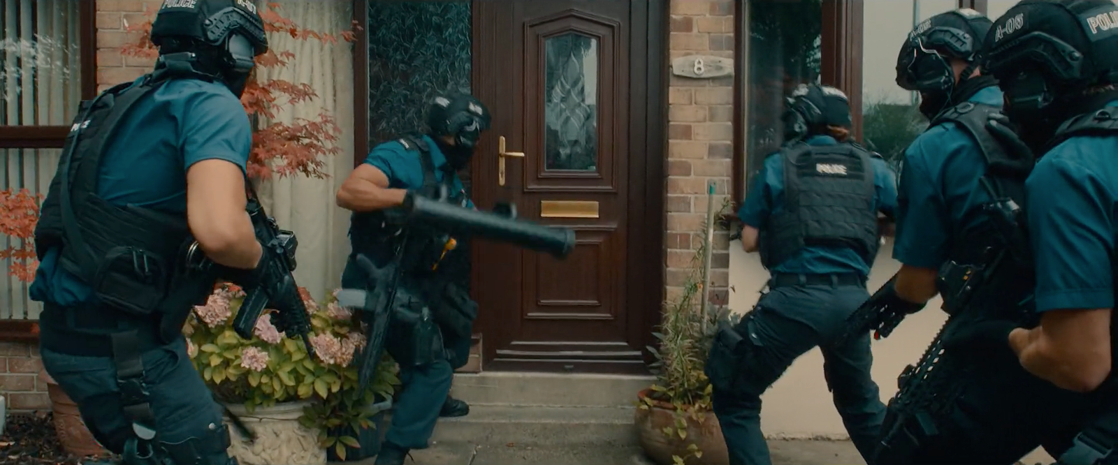 Bodies DS Hasan and the Police raid Elias's house