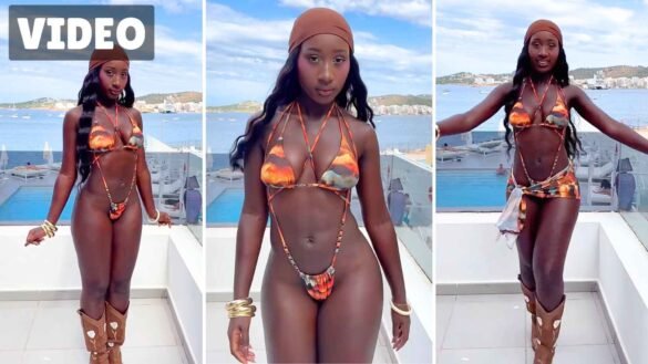 Nakya Mami in a strappy sunset print bikini with head scarf and boots in Ibiza in three poses from her viral video